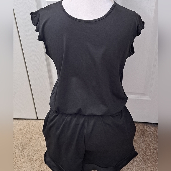 Black Romper With A Ruffled Short/Swimsuit - Picture 9 of 9